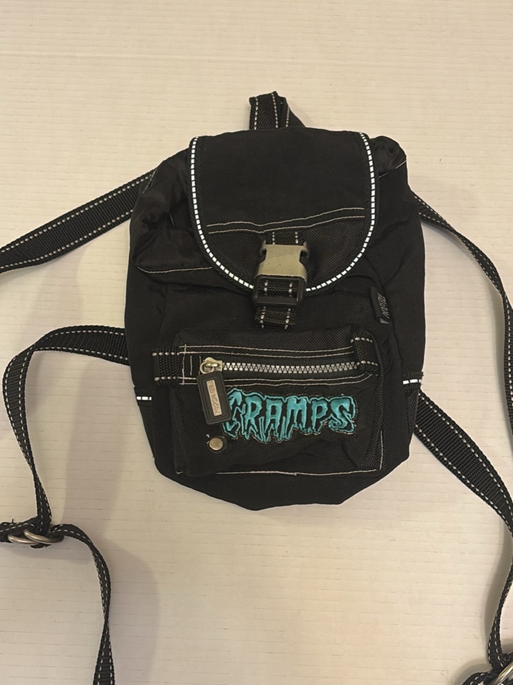 Black Mini Backpack with Teal "CRAMPS" Patch